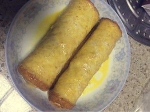 【快手早餐】芝心香肠卷的做法步骤 第4步