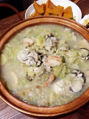 海蛎子酸菜紫铜锅的做法步骤 第3步