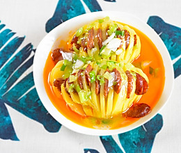 #硬核菜谱制作人#怪味腊肠蒸风琴土豆的做法