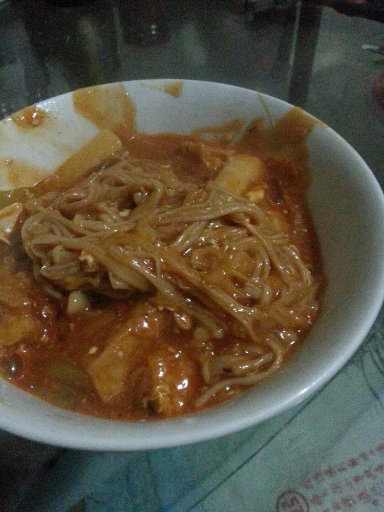 金针菇炒年糕的做法