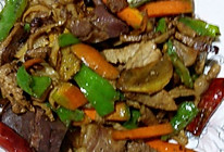 五花肉炒羊杂的做法