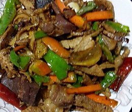 五花肉炒羊杂的做法