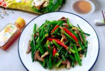 韭菜苔炒肉的做法