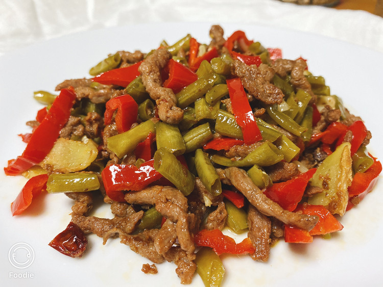 酸豆角炒牛肉的做法